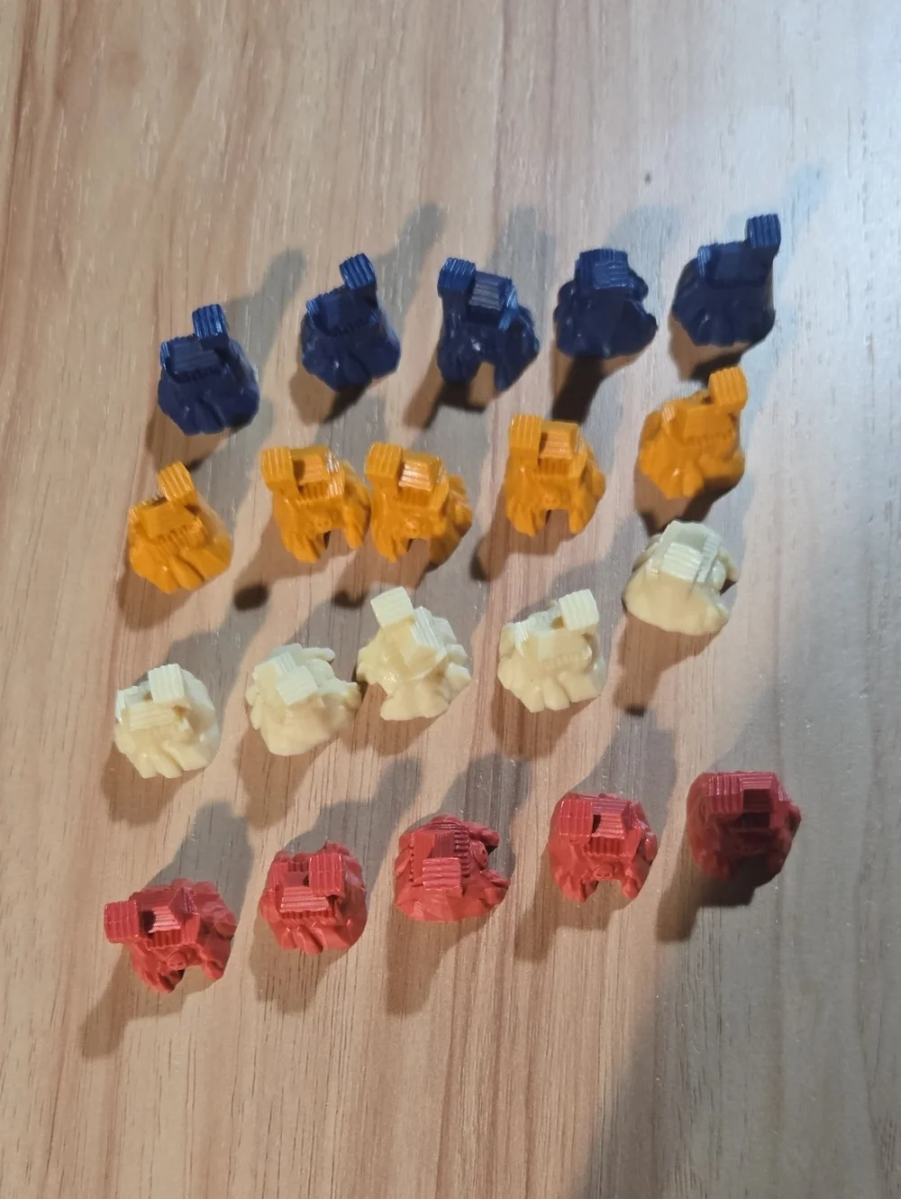 Source Unknown Multi-Color Small Game Pieces Set - Blue, Yellow, Cream, Red Tiki
